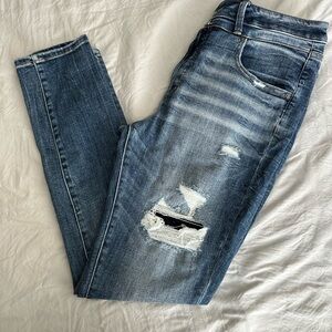 Buckle Blue Skinny Jeans with Distressed Details